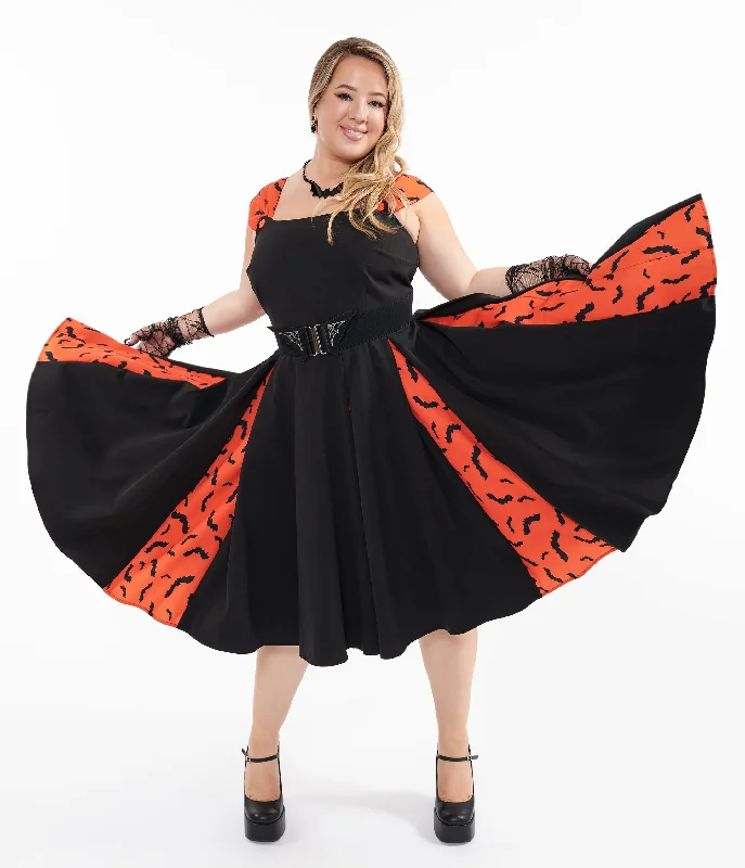 Plus size tropical - themed sundress for a sunny dayUnique Vintage Plus Size 1950s Orange & Black Bat Stripe Swing Dress Plus size tropical - themed sundress for a sunny dayUnique Vintage Plus Size 1950s Orange & Black Bat Stripe Swing Dress