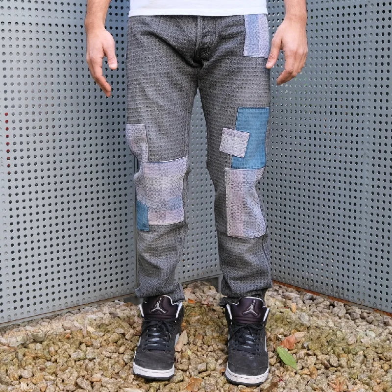 Mom jeans for a nostalgic and casual lookStudio D'Artisan Black Boro "Sashiko Denim" Jeans (Relax Tapered)